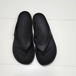 Crocs black flip flops